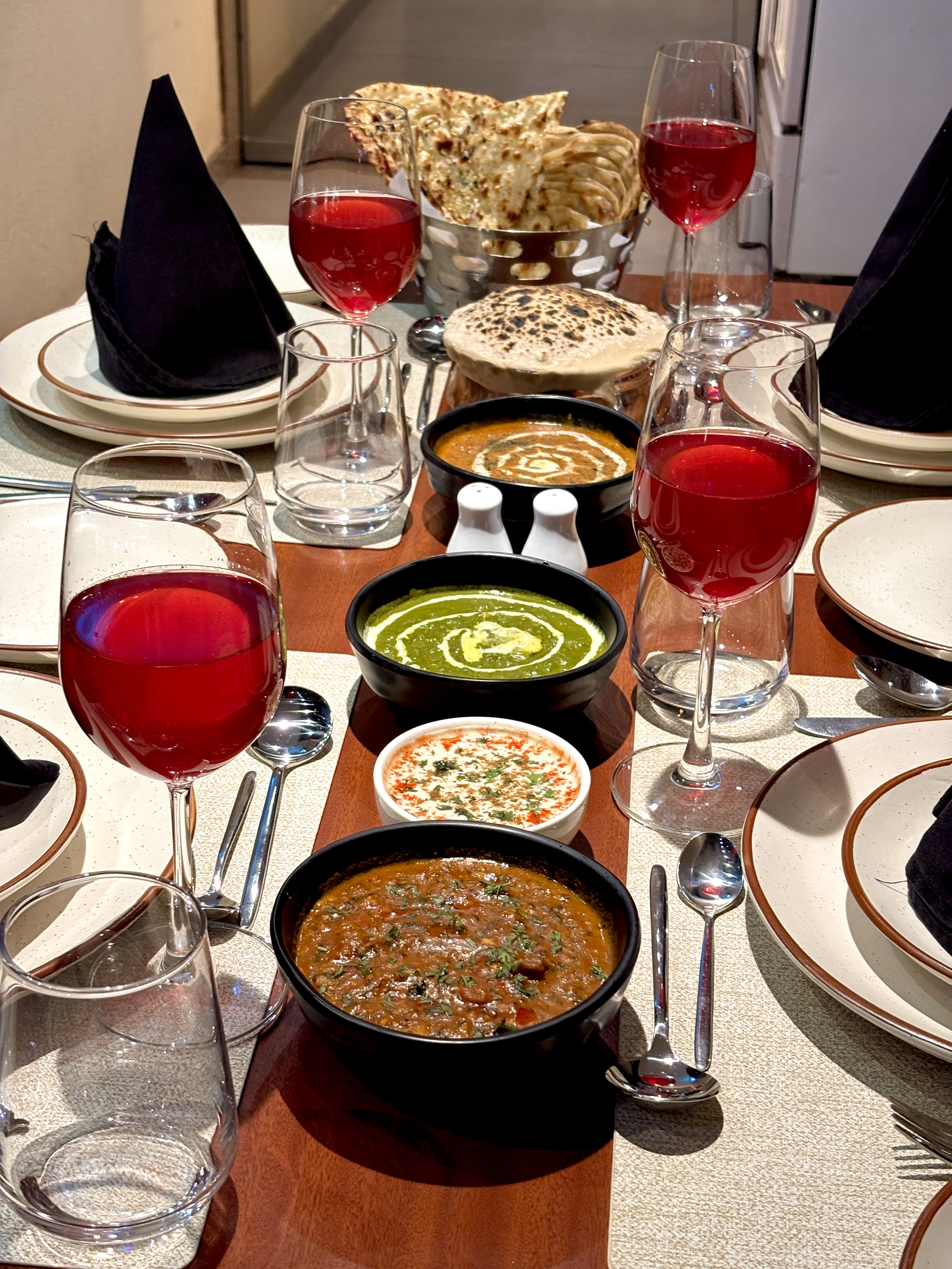 Indian curries and breads table